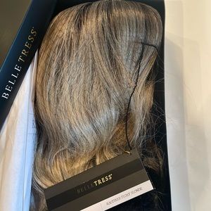 Never worn ….still has tag. In box.   Picture of lady shoes the style not color